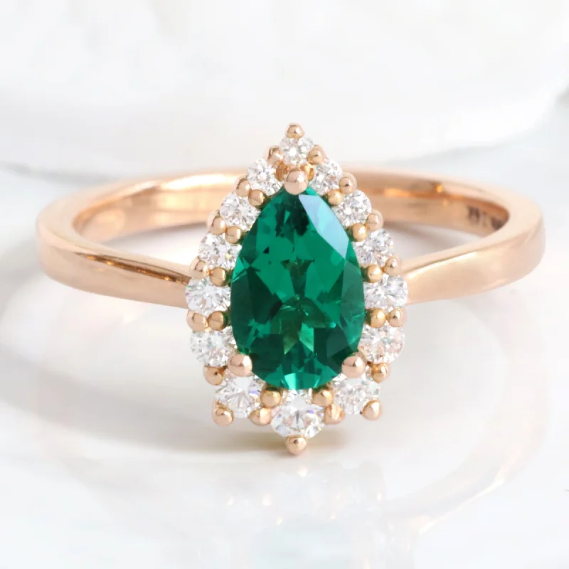 Pear Emerald Engagement Ring in Tiara Halo Diamond Tapered Band