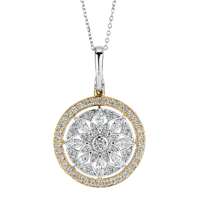 Fancy pendant with 1.43 carats* of diamond simulants in 10 carat yellow gold and sterling silver